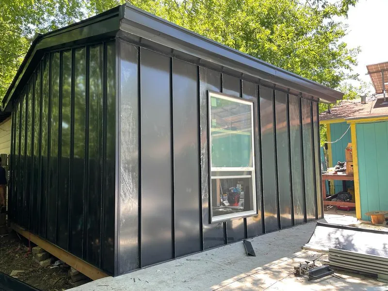 Black standing seam metal wall panels for Metal Roof Installation in Port Orange